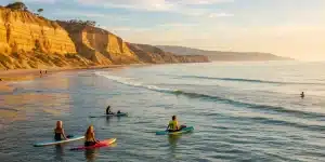 Large group paddleboarding in San Diego.