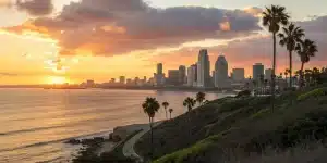 San Diego city skyline and coastline at sunset on a full day city tour.