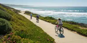 A group on a San Diego bike tour enjoying sunny coastal views.
