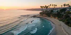 Aerial view of the La Jolla coastline at sunset, the best way to see the cliffs and beaches.